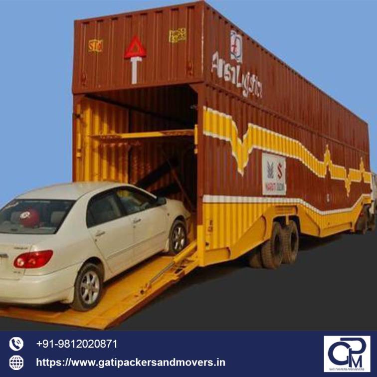 a sedan unloading from a truck after gati packers and movers bangalore car shifting service