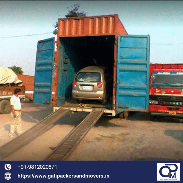 car getting loaded in a truck for shifting services by gati packers and movers car shifting services in bangalore