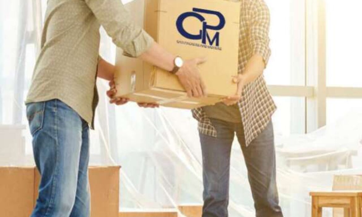 two men holding gati packers and movers packaging box