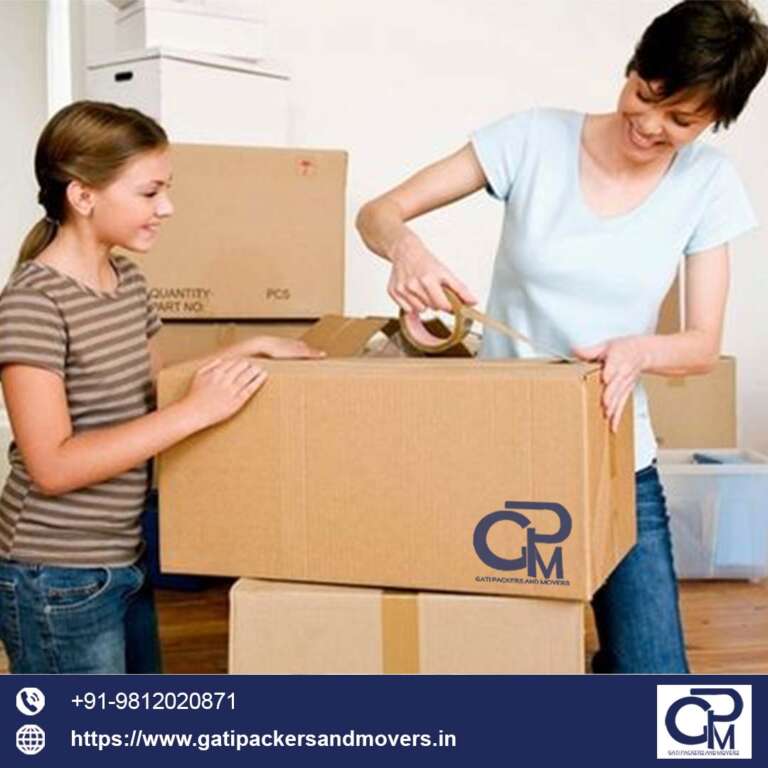 Gati packers and movers women and a girl packing gati packers and movers boxes
